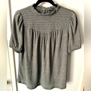 Women’s grey/green top